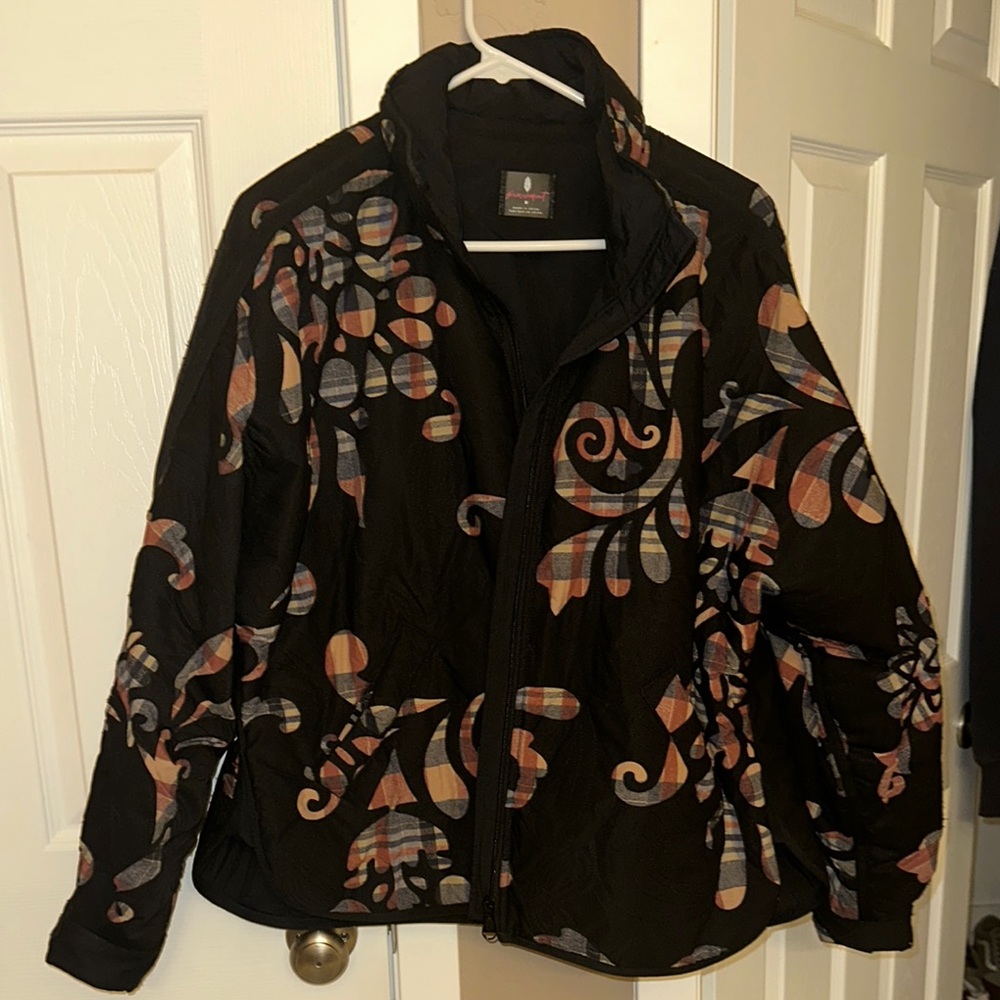 Black Ski Jacket with Bold Floral Pattern and Heavy Fabric